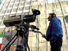 Streamliner cameraman during field production, New York City